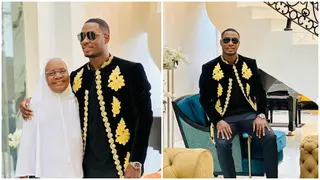Odion Ighalo shows off lavish sitting room, hugs beloved mother in amazing cute photos