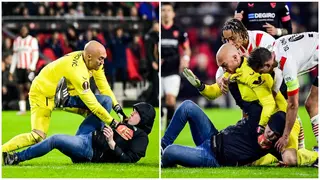 Watch Sevilla Goalkeeper Fight Back After Getting Attacked by Fan in Europa League Game Against PSV