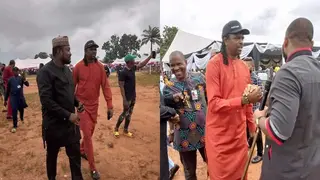 Super Eagles Legend Kanu Storms Oba in Style for Obi Cubana Mum's Burial as Fans Rush to Take Selfie with Him