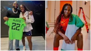 Reactions As Super Falcons Beauty Michelle Alozie Meets 'Unavailable' Crooner, Davido