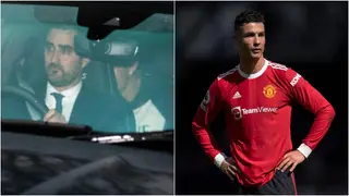 Cristiano Ronaldo appears to duck for cover from cameras in first training session since phone incident