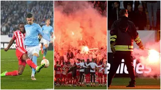Europa League game temporarily suspended after 'huge blast' as fans launch multiple fireworks onto the pitch