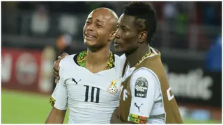 Former Ghana Captain Asamoah Gyan Consoles Andre Ayew After Penalty Miss Against Uruguay