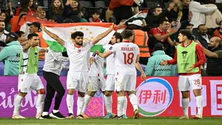 Debutants Tajikistan reach Asian Cup knockouts, China on brink