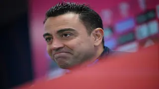 Xavi expecting 'wounded' Madrid to wage war in cup Clasico