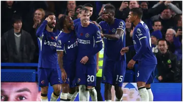 Chelsea players celebrate after scoring during the Premier League match between Chelsea FC and Manchester City at Stamford Bridge. Photo by Clive Rose.