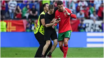 Portugal head coach, Robert Martinez, has expressed concern about his players' safety after pitch invasions. Photo by Daniela Porcelli.