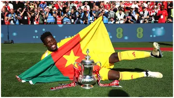 Andre Onana, celebrates with the FA Cup after Man United beat Man City at Wembley Stadium on May 25, 2024. Photo: AndreyOnana.