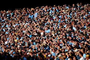 Manchester City fans are seen celebrating