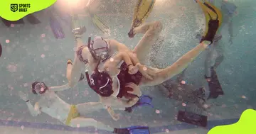 Underwater rugby players in action