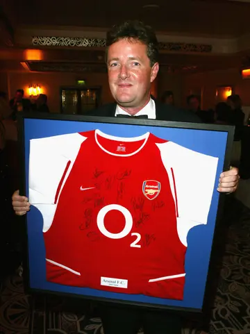 What football team does Piers Morgan support?