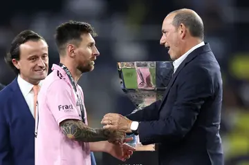 Lionel Messi shakes hands with MLS Commissioner Don Garber after defeating Nashville to win the Leagues Cup final in August