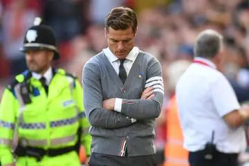 Scott Parker cut a disconsulate figure on the touchline as his Bournemouth side lost 9-0 at Anfield