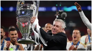 Carlo Ancelotti, celebrates with the UEFA Champions League trophy after Real Madrid beat Borussia Dortmund 2-0 in the final at Wembley Stadium on June 1, 2024 in London, England. Photo: Alex Pantling.