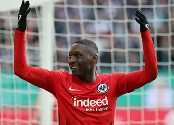 Frankfurt forward Randal Kolo Muani scored two in two minutes to send his side through to the German Cup semis