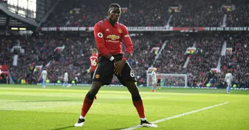 Paul Pogba celebrates after scoring during a Premier League match between Manchester United and West Ham United at Old Trafford. Photo by Gareth Copley.