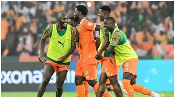 Ivory Coast players celebrate after winning at the end of the AFCON 2023 semi-final against DR Congo at Alassane Ouattara Olympic Stadium in Ebimpe, Abidjan on February 7, 2024. Photo: Sia Kambou.