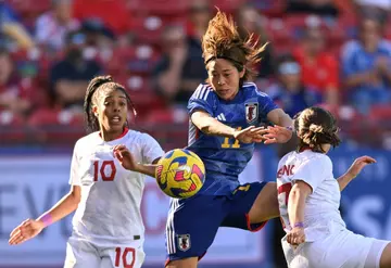 Japan forward Rikako Kobayashi (11) heads the ball against Canada defender Ashley Lawrence (10) and Canada midfielder Jessie Fleming (17) during the 2023 SheBelieves Cup soccer match between Canada and Japan in Frisco, Texas, in February 2023.