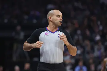 Different referee hand signals in basketball