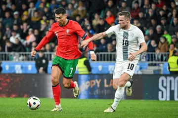 Cristiano Ronaldo (L) is poised to appear at his 11th major tournament for Portugal this summer at Euro 2024