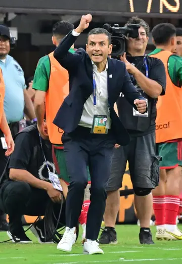 Mexico's interim coach Jaime Lozano reacts to a referee's call late in his team's 1-0 victory over Panama in the CONCACAF  Gold Cup final