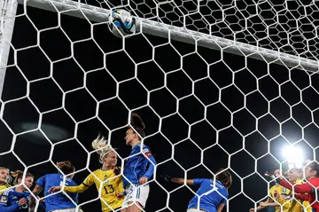 Sweden's defender Amanda Ilestedt heads her team's fourth