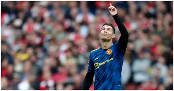 Cristiano Ronaldo gestures after scoring during the English Premier League football match between Arsenal and Manchester United at the Emirates. Photo by Ian Kington.