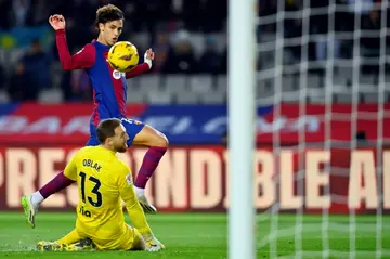 Barcelona's Portuguese forward Joao Felix scores the winner against his parent club Atletico Madrid in La Liga on Sunday