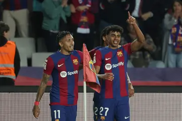 Lamine Yamal (R) and Raphinha (L) scored the goals for Barcelona as they beat Real Sociedad to go second on Monday