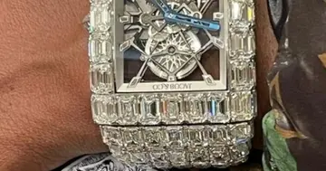 Boxing Icon Floyd Mayweather Shows Off His Incredible £14million Diamond and Gold Watch