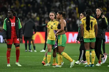 Jamaica players reacts after their Women's World Cup loss to Colombia