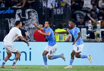 Pedro (C) celebrates after scoring Lazio's third goal in a 3-1 win over Inter Milan