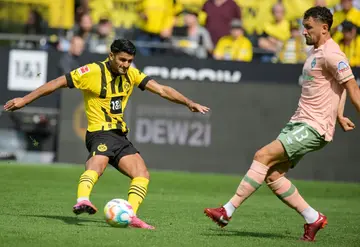 Mahmoud Dahoud (left) will join Brighton on a free transfer from Borussia Dortmund