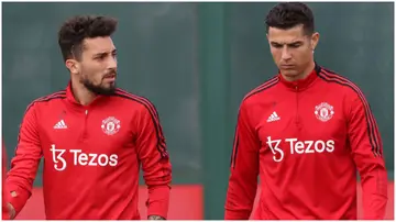 Alex Telles and Cristiano Ronaldo in action during a first-team training session at Carrington Training Ground. Photo by Tom Purslow.