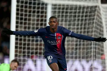 Ousmane Dembele celebrates after scoring his goal in PSG's 5-2 win over Monaco in Ligue 1 on Friday