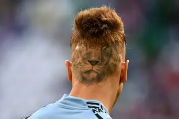 Losing their heads over football: Uruguay's goalkeeper Sebastian Sosa and his World Cup haircut