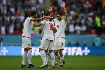 Iran celebrate their World Cup win against Wales