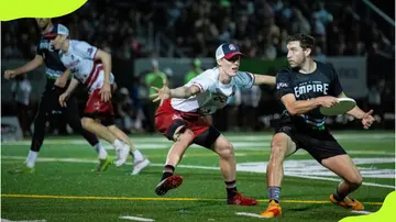 Ben Oort blocks Elliott Chartock during their frisbee match.