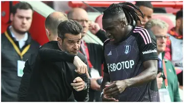Fulham coach, Marco Silva, gives instructions to Calvin Bassey during the Premier League match against Brentford at Brentford Community Stadium on May 4. Photo:  Vince Mignott.