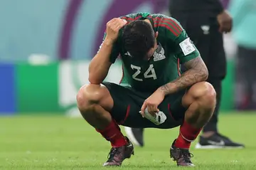Mexico crashed out of the World Cup despite beating Saudi Arabia 2-1