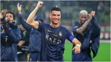 Cristiano Ronaldo celebrates after winning the Saudi Pro League match between Al-Taawoun and Al-Nassr at King Abdullah Sport City Stadium. Photo by Yasser Bakhsh.