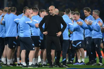 Pep Guardiola takes in Manchester City's victory in Saturday's Champions League final