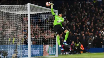 David Raya fails to make a save as Mykhaylo Mudryk of Chelsea (not pictured) scores Chelsea's second goal against Arsenal FC at Stamford Bridge. Photo by Justin Setterfield.