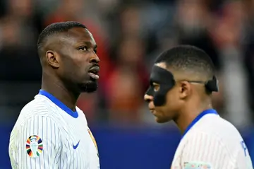 France forward Marcus Thuram (L) next to Kylian Mbappe. A France player has not scored a goal from open play.