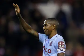 Aston Villa defender Ashley Young acknowledges the applause for his goal