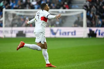 Kylian Mbappe celebrates after scoring against Le Havre