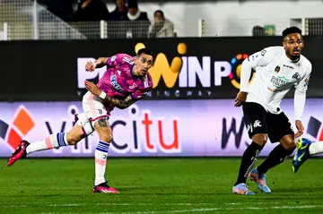 Angel Di Maria (L) secured the points for Juve with his fourth Serie A goal