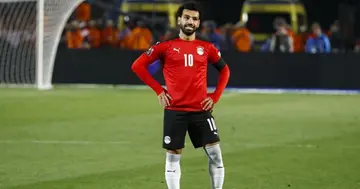 Mohamed Salah stands over a free-kick during the 2022 Qatar World Cup African Qualifiers football match between Egypt and Senegal. Photo by KHALED DESOUKI.