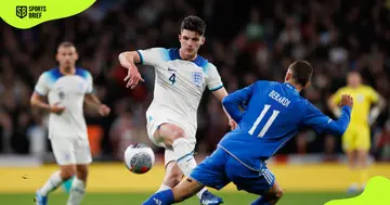 England's Declan Rice (c) is in action.