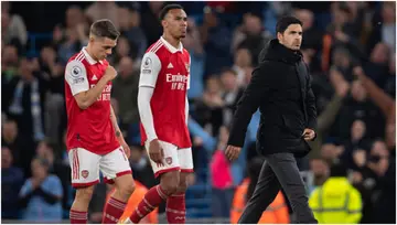 Mikel Arteta walks off the pitch looking dejected followed following the Premier League match between Man City and Arsenal FC at Etihad Stadium. Photo by Joe Prior.